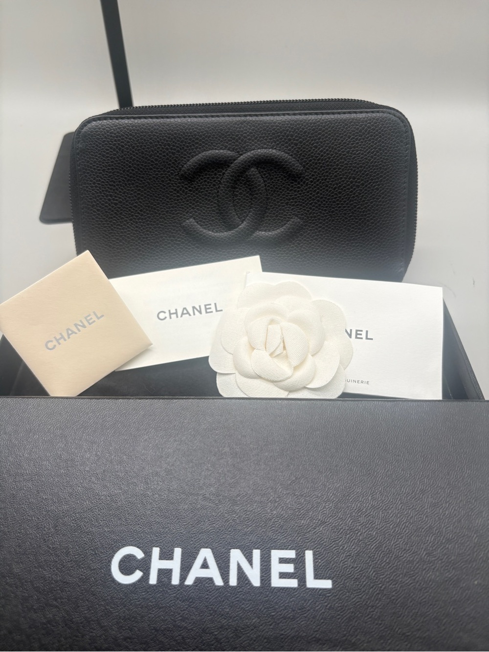 CHANEL Black Caviar Leather Zip-Around Wallet with Embossed CC